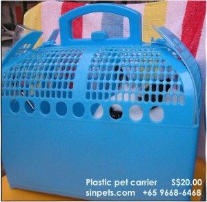 Plastic carrier for small breeds and rabbits - prevents pet from falling down and fracturing the legs. 