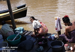 Lake Inle, Myanmar. Rural women wash clothes and hair. Toa Payoh Vets